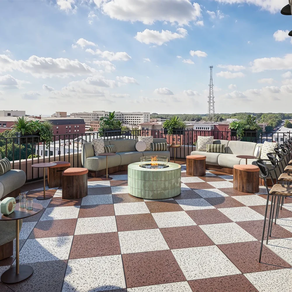 5th floor amenity deck with firepit lounge seating and bar seating
