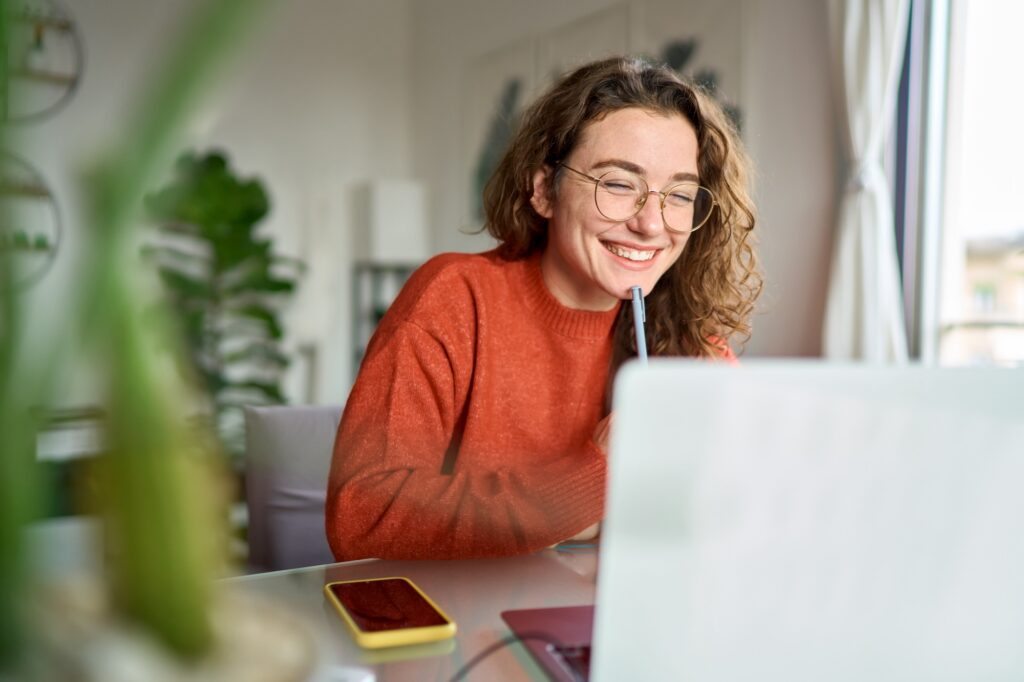 student looking at ncsu meal plan options on a laptop