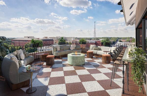 5th floor amenity deck with firepit lounge seating and bar seating