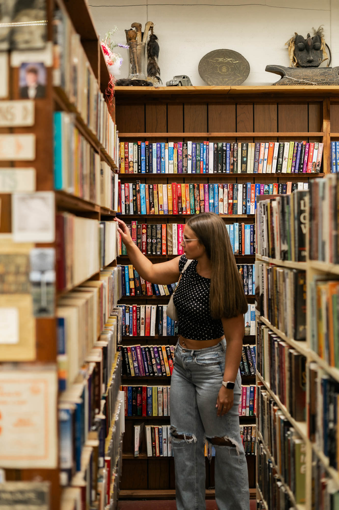 Student browsing books at the library